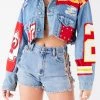 FURST OF A KIND VINTAGE NFL VINTAGE JERSEY PATCHWORK STUDDED CROPPED DENIM JACKET