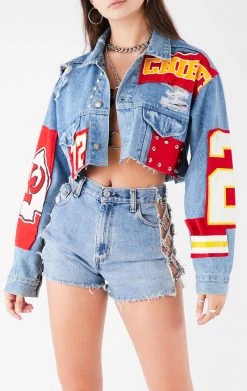 FURST OF A KIND VINTAGE NFL VINTAGE JERSEY PATCHWORK STUDDED CROPPED DENIM JACKET